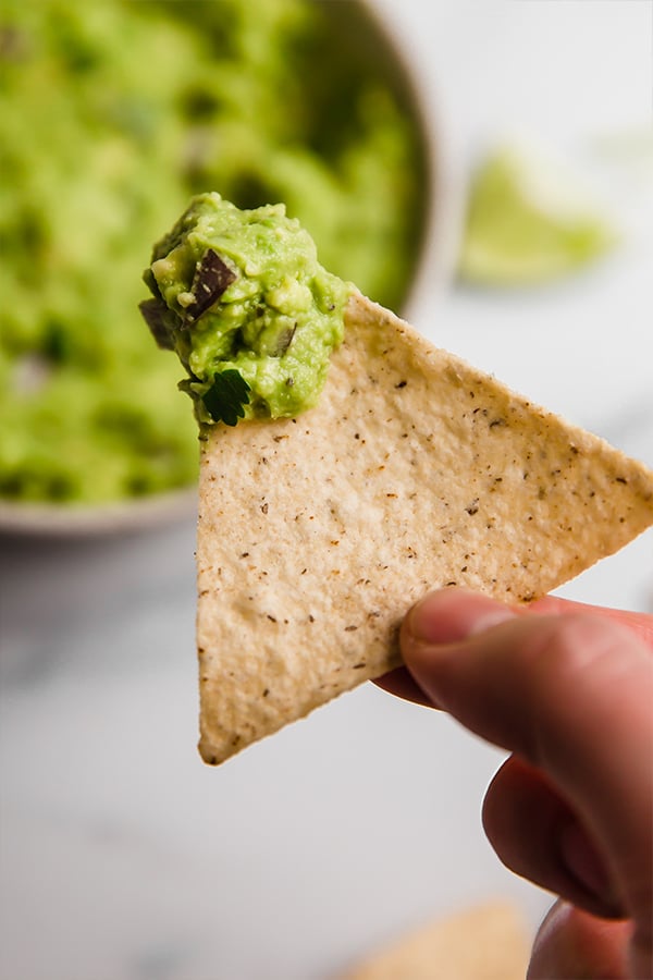 Up close chip with guacamole on it