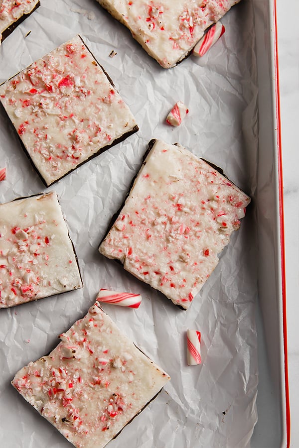 Peppermint bark pieces on a baking dish.