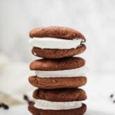 A stack of three ice cream sandwiches on top of each other.