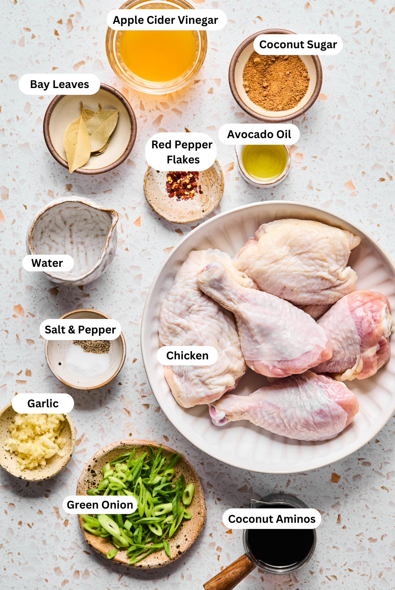 All the ingredients to make Adobo Chicken in bowls.