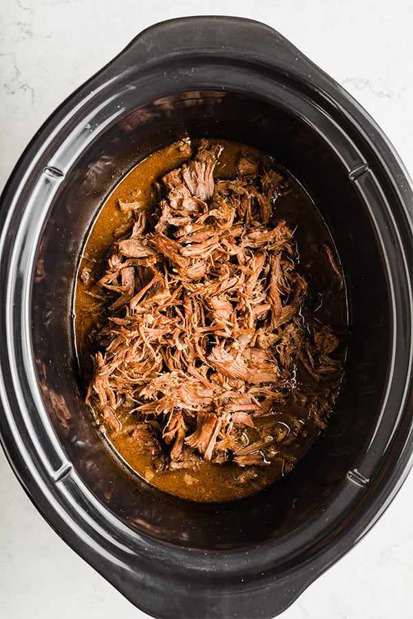 The Best Slow Cooker Shredded Beef Recipe - NeighborFood