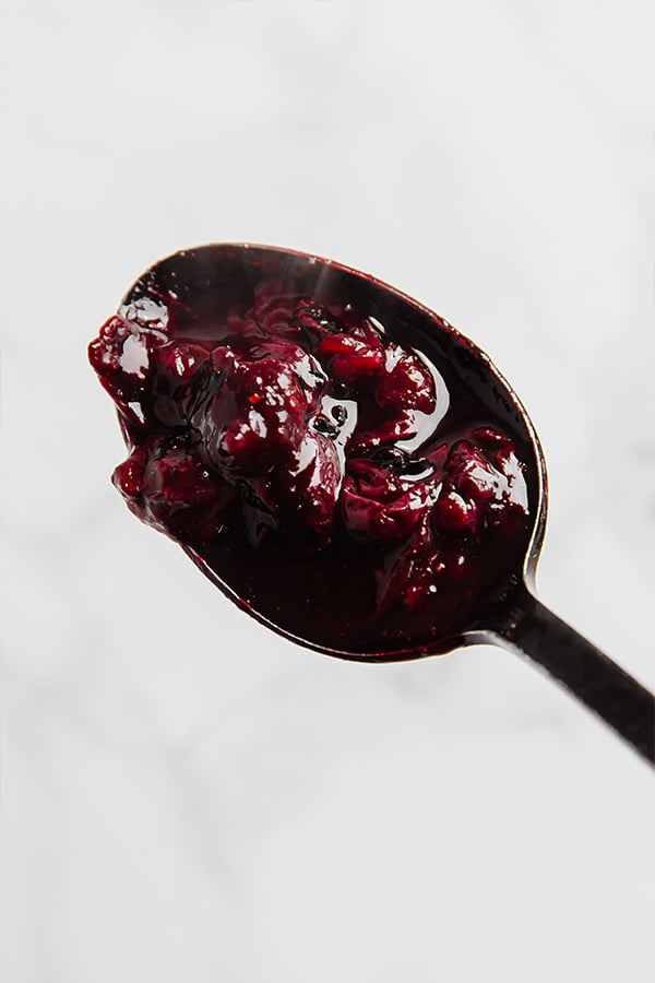 Blueberry sauce on spoon