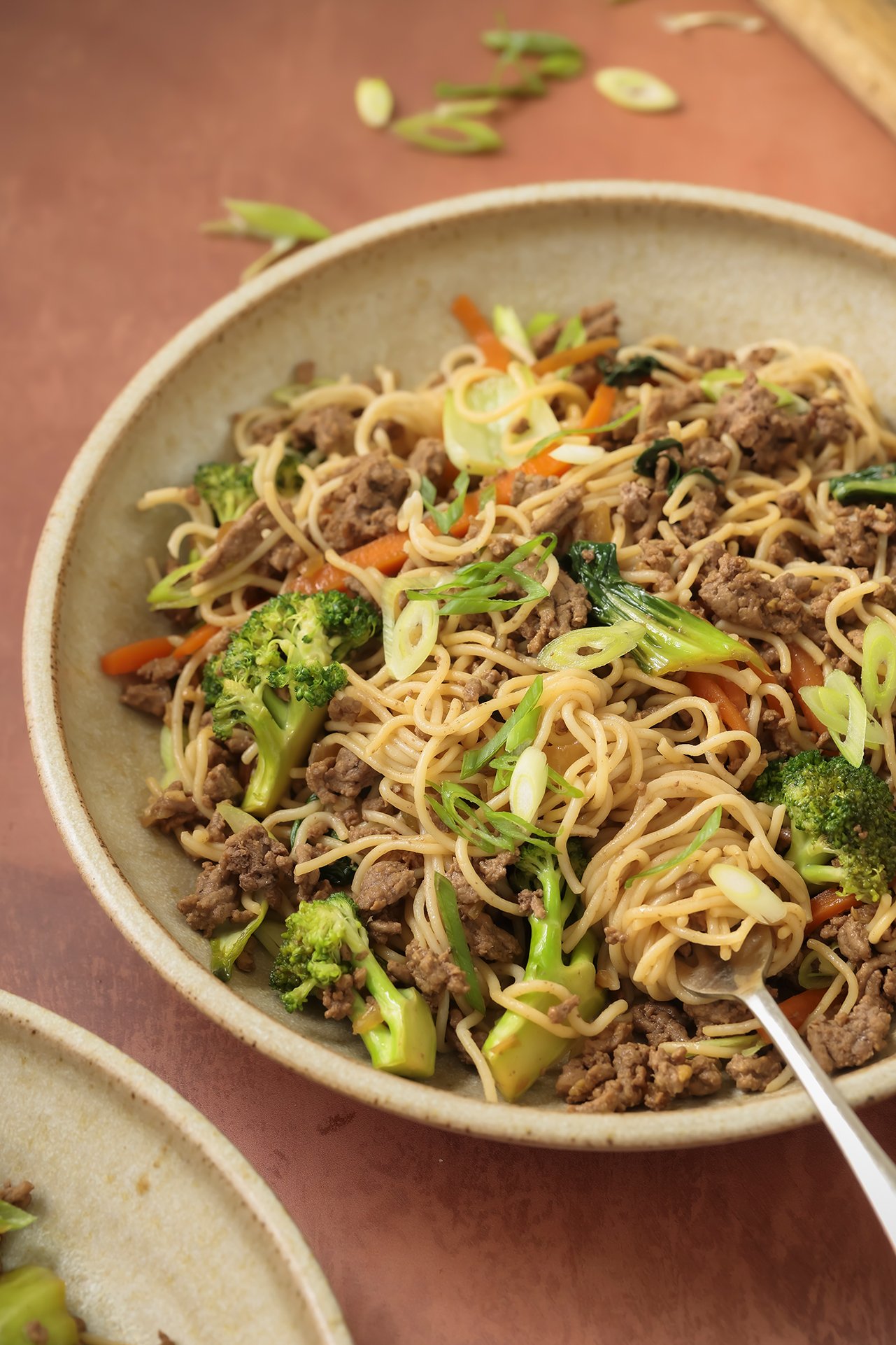 Ground beef ramen stir fry in a large bowl.