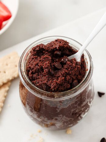 Edible brownie batter in a glass jar.