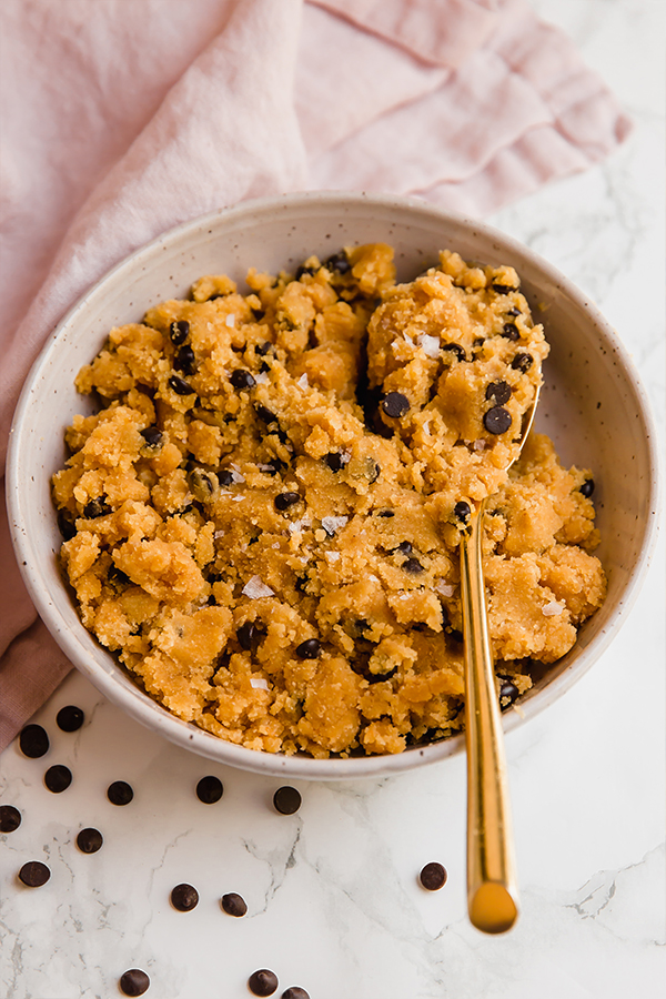 no bake pumpkin chocolate chip cookie dough in bowl with spoon