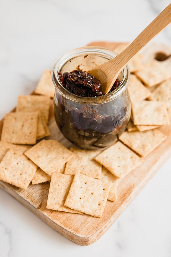 Apple Bacon Jan in jar with spoon and crackers