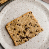 slice of sheet pan chocolate chip cookie on plate