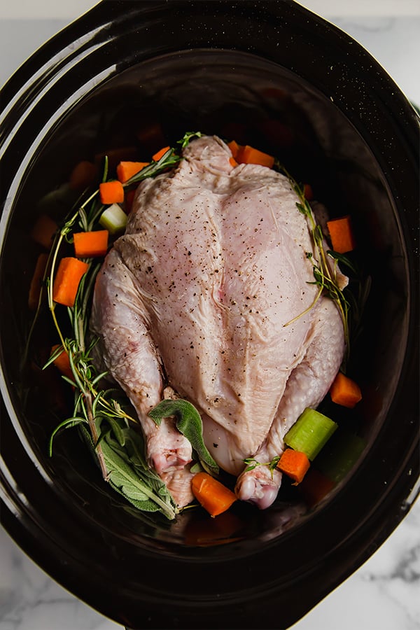 whole chicken and veggies in slow cooker