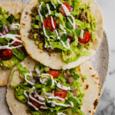 Ground beef tostadas on a plate.