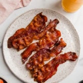 Plate of cooked bacon.