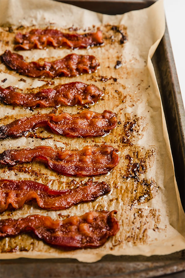 Sheet pan with cooked bacon fresh out of the oven