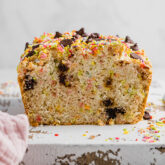 Sliced loaf of chocolate chip ice cream bread.