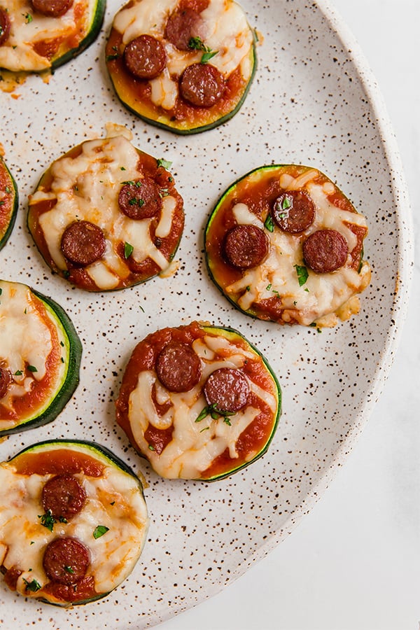 Zucchini pizza bites on plate