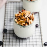 Fruit-on-the-bottom yogurt jar topped with honey roasted almonds.
