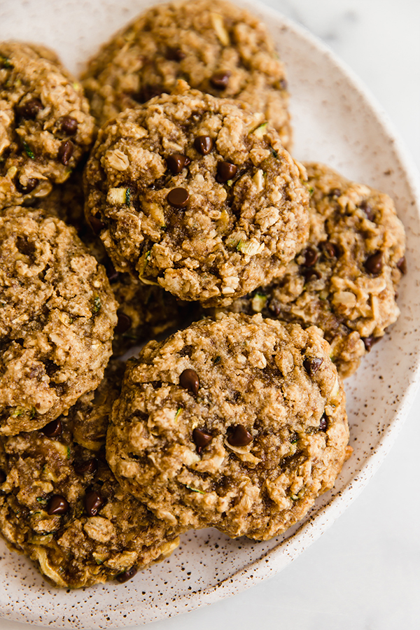 Oatmeal zucchini cookies stacked on a plate
