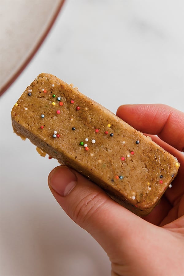 Protein bar held in hand