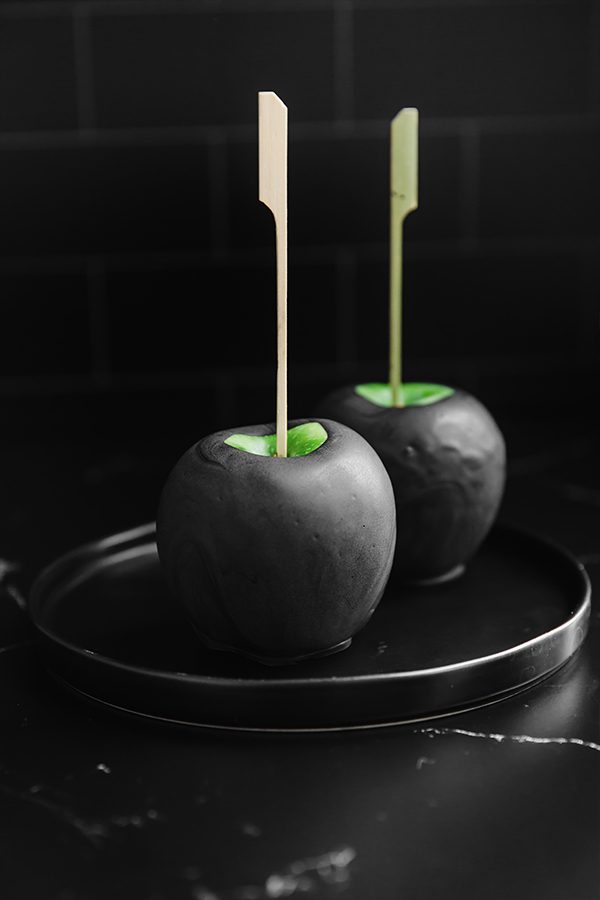 Two poison apples on a plate.