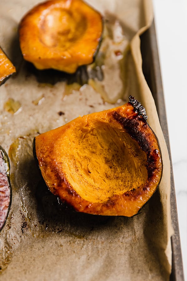 Acorn squash after being roasted in the oven.