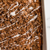 Baking dish of sweet potato casserole with streusel topping.