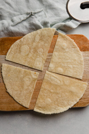 Tortilla cut into fourths.