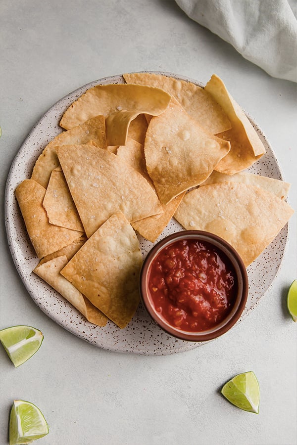 A plate of almond flour tortilla chips with salsa.