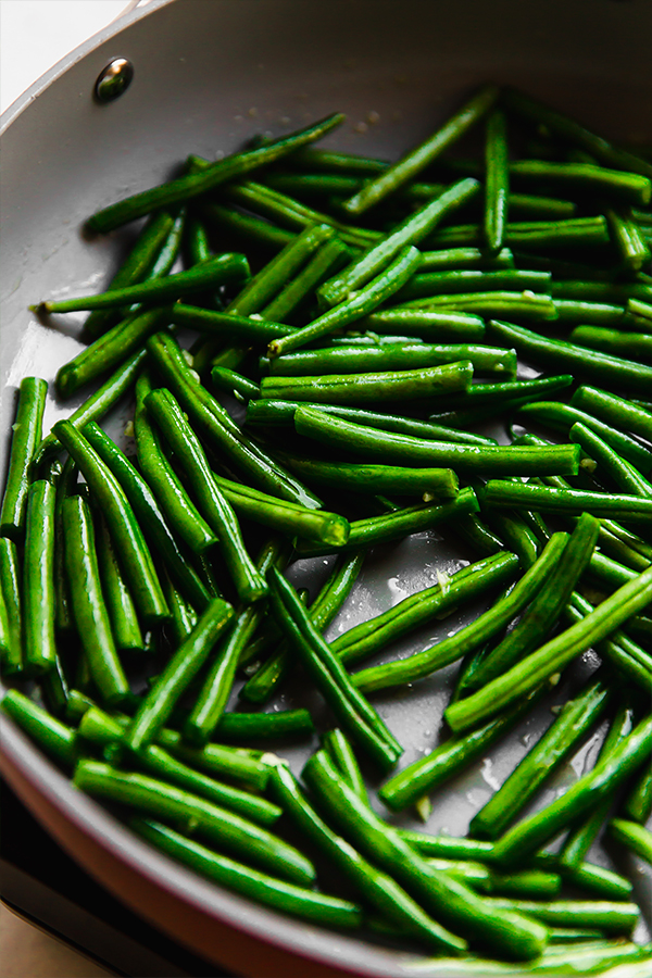 Green beans in a saute pan.