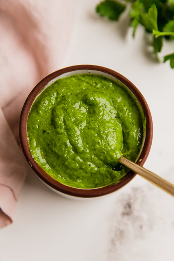 A cup of avocado chimichurri sauce.