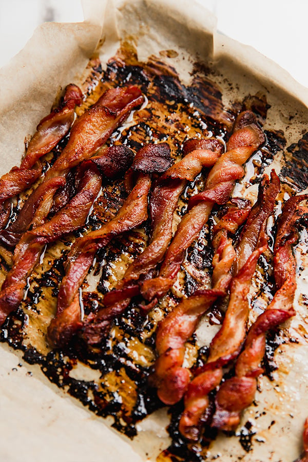 Oven bacon twists on a sheet pan after baking.