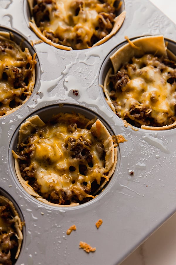 A tray of baked mini taco cups.