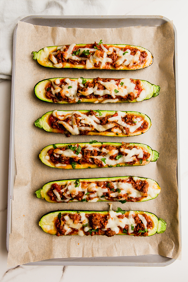 Easy beef stuffed zucchini on a sheetpan after baking.