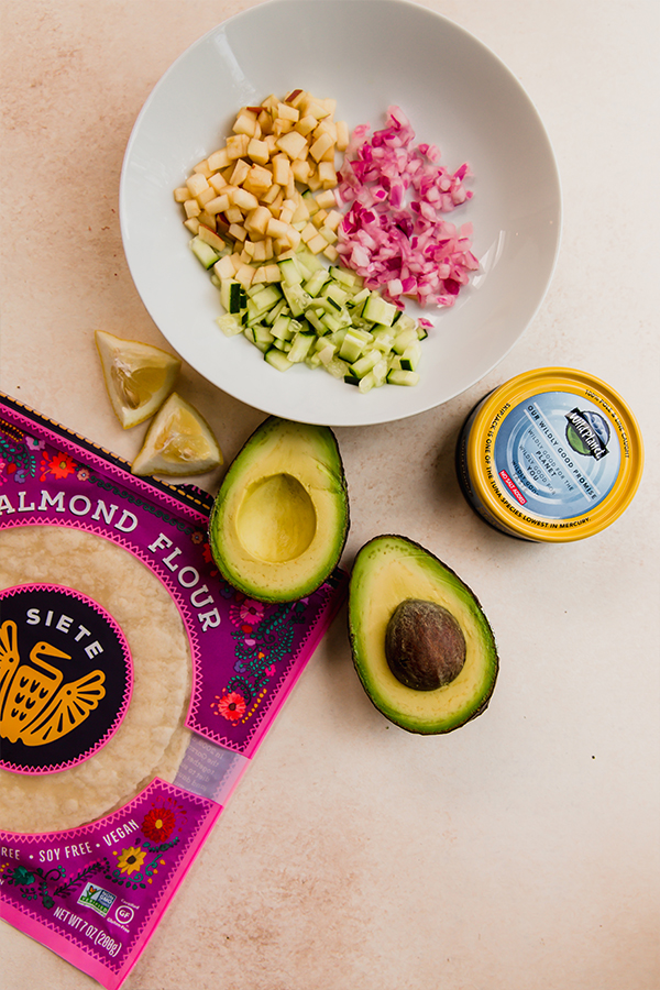 The ingredients for avocado tuna salad pinwheels. 