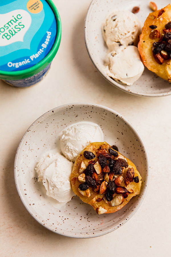 A bowl of air fryer "baked" apples with ice cream and toppings.