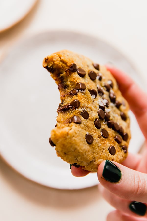 The single serve pumpkin cookie with a bite taken out of it.