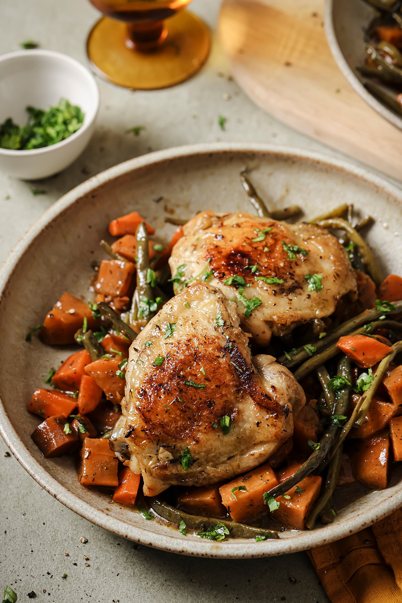 Slow cooker balsamic chicken and veggies in a bowl.