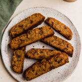 Gluten-free chocolate chip biscotti on a plate.