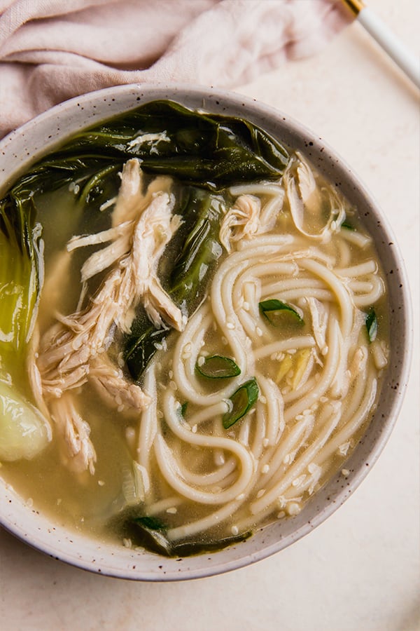 A bowl of bok choy noodle soup