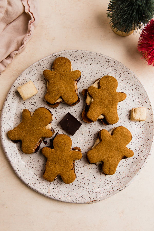 A plate of gingerbread s'mores cookies
