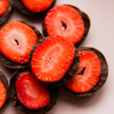 Chocolate strawberry crunch bites piled on a plate.