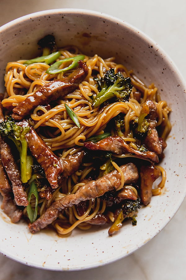 A bowl of sheet pan Mongolian beef in a bowl.