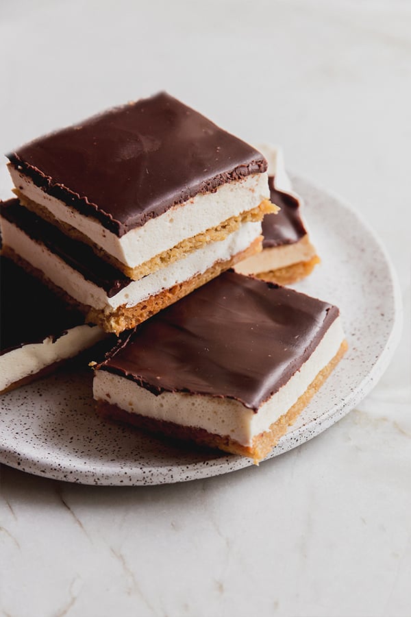 A stack of s'mores bars on a plate.