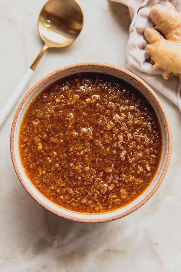 A bowl of a hibachi ginger sauce on the counter.