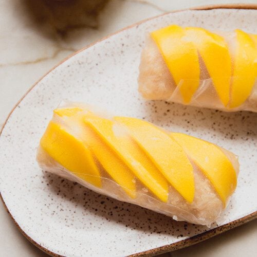 https://unboundwellness.com/wp-content/uploads/2023/06/mango_sticky_rice_rolls_1-500x500.jpg