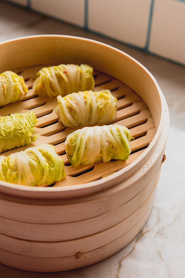Cabbage roll dumplings in a steamer