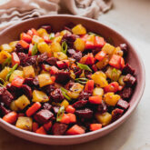 Hot dog and veggie hash in a bowl.
