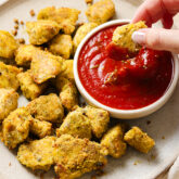 Plate of crispy Italian chicken nuggets with dip.