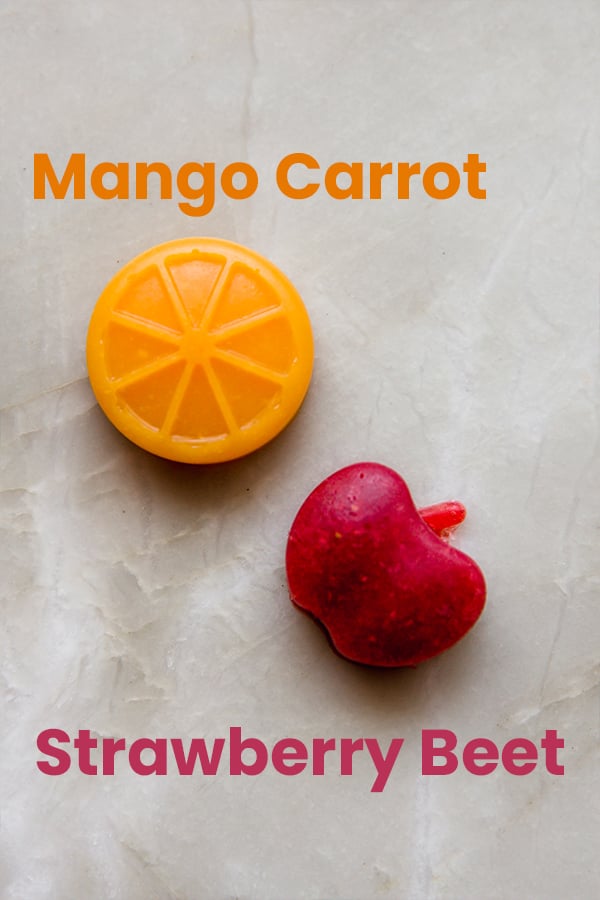 A mango carrot fruit snack next to a strawberry beet fruit snack.