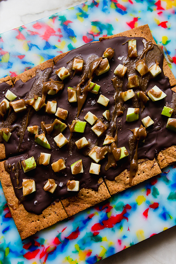 Caramel apple graham cracker bark sitting on the counter.