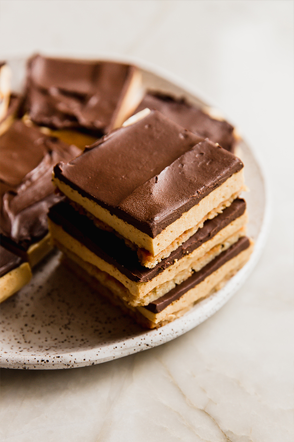A plate stacked with pumpkin spice s'mores.