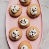 Pink platter of cannoli thumbprint cookies.