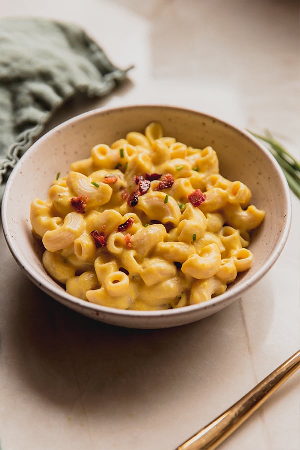 A bowl of dairy-free pumpkin mac and "cheese" before being eaten.